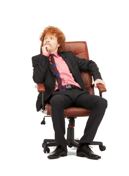 Ung affärsman som sitter i stol — Stockfoto