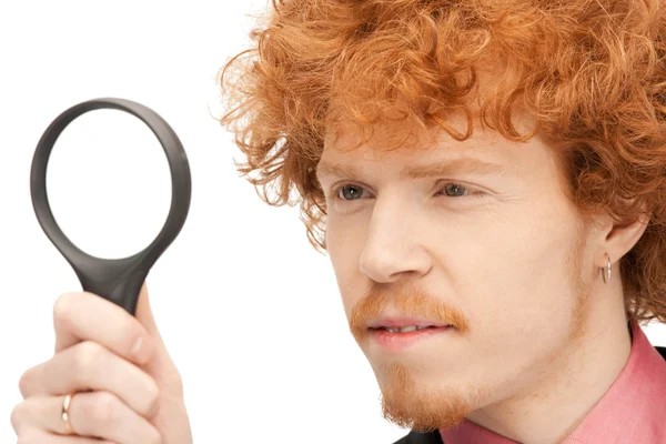 stock image Man with magnifying glass