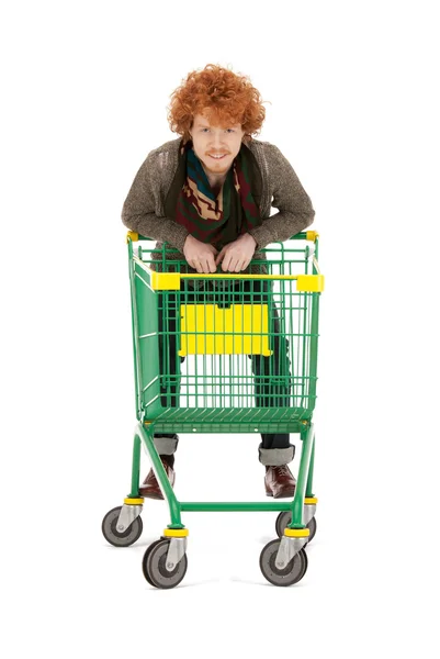Homem com carrinho de compras — Fotografia de Stock