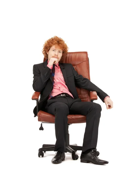 Jonge zakenman zittend in stoel — Stockfoto
