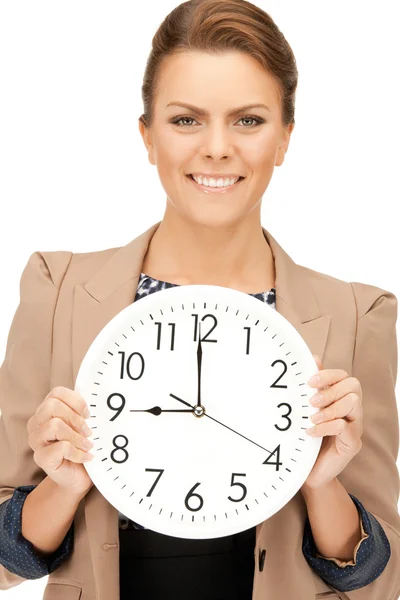 Mujer sosteniendo reloj grande —  Fotos de Stock