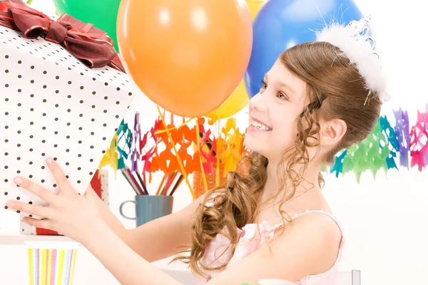 Party girl with balloons and gift box — Stock Photo, Image