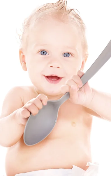 Niño con cuchara grande — Foto de Stock
