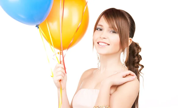 Menina adolescente feliz com balões — Fotografia de Stock