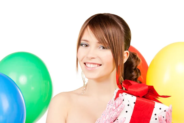 Party lány léggömbök és ajándék doboz — Stock Fotó