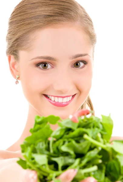 Happy woman with spinach — Stockfoto