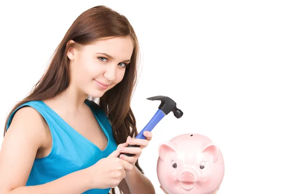 少女与猪存钱罐和锤子 — 图库照片
