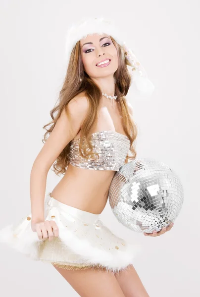 Sexy santa helper met disco bal — Stockfoto