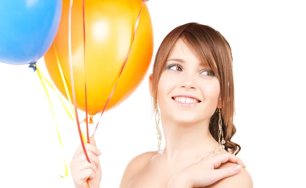 Glad tonårsflicka med ballonger — Stockfoto