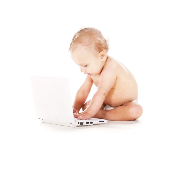 Baby boy with laptop computer — Stock Photo, Image