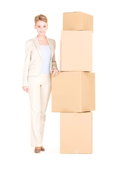 Mujer de negocios con cajas —  Fotos de Stock