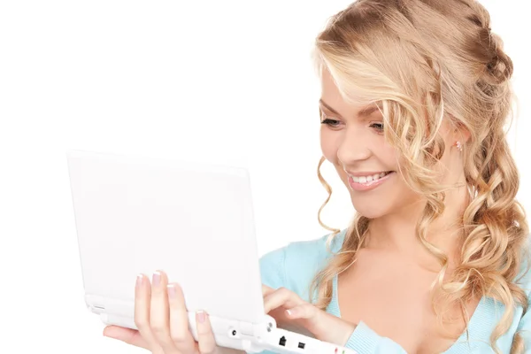 便携式计算机的幸福女人 图库图片