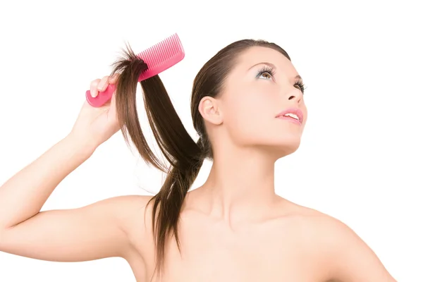 Woman with comb Stock Photo
