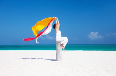 Happy woman on the beach clipart