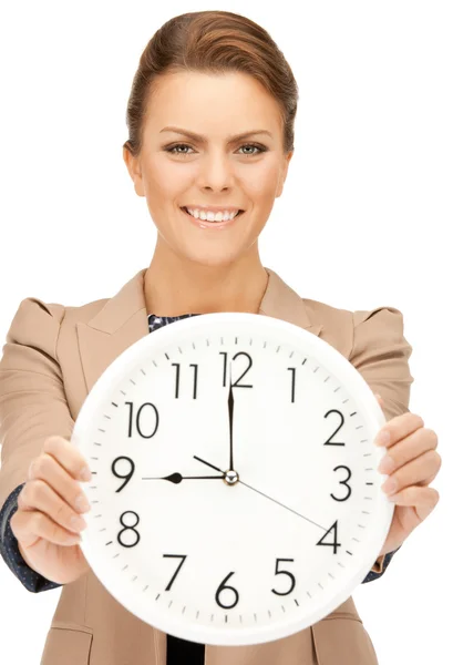 Mujer sosteniendo reloj grande —  Fotos de Stock