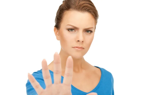 Женщина делает жест стоп — стоковое фото