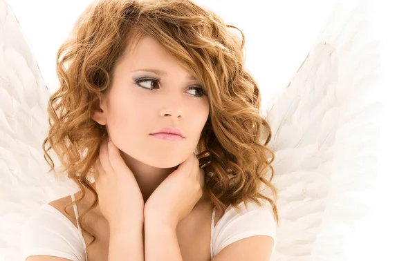 Нещаслива дівчина ангела-підлітка над білим — стокове фото