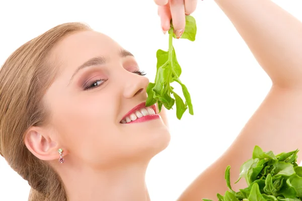 Happy woman with spinach — Stock Photo, Image
