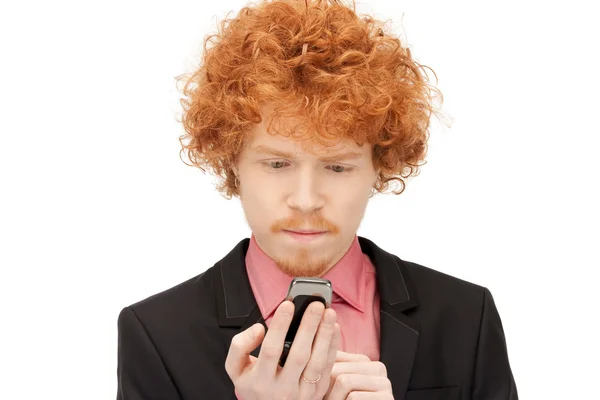 Hombre guapo con teléfono celular — Foto de Stock