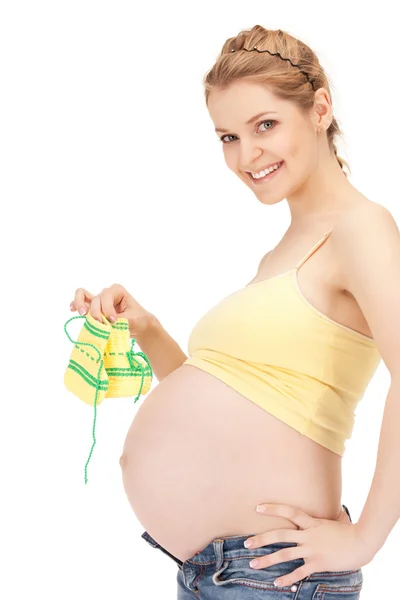 Kobieta w ciąży z skarpety — Zdjęcie stockowe