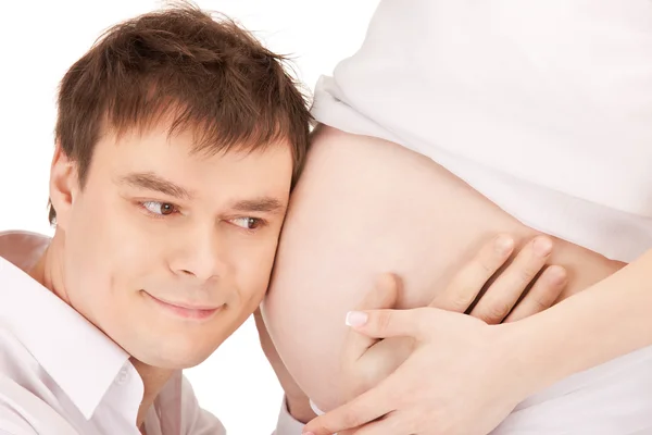 Mannengezicht van zwangere buik — Stockfoto