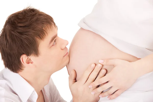 Mannengezicht van zwangere buik — Stockfoto