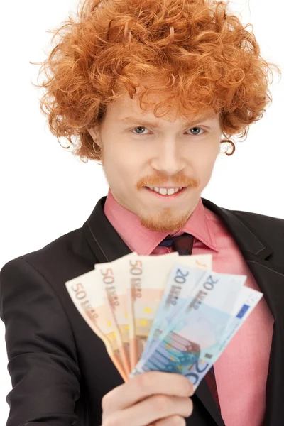 Красивий чоловік з готівкою євро — стокове фото