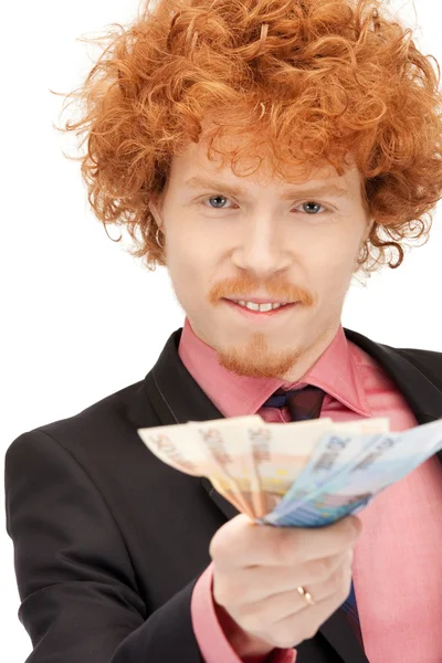 Jóképű férfi euro-készpénzre — Stock Fotó