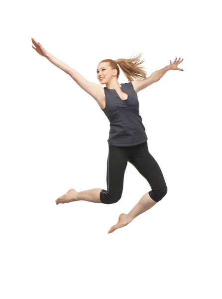Saltando menina desportiva — Fotografia de Stock
