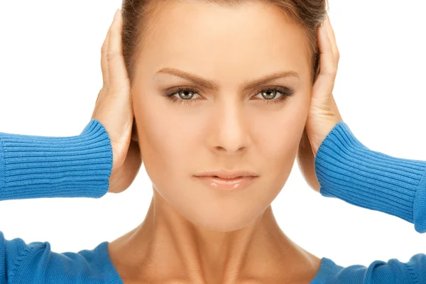 Woman with hands on ears Royalty Free Stock Photos