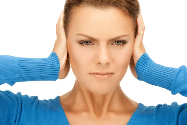 Woman with hands on ears Royalty Free Stock Photos