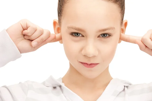 Adolescente chica con los dedos en las orejas —  Fotos de Stock