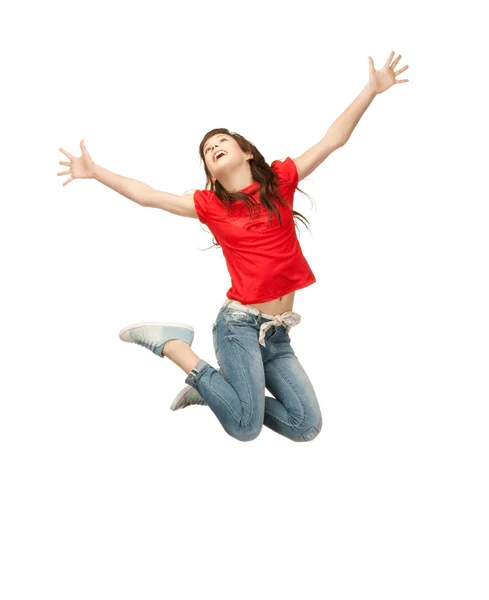 Jumping teenage girl Stock Picture