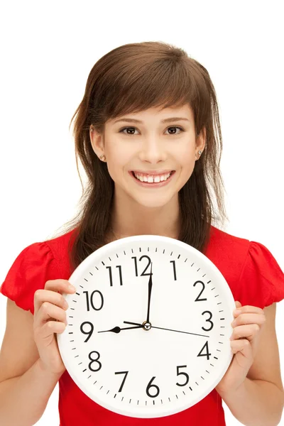 Adolescente menina segurando grande relógio — Fotografia de Stock