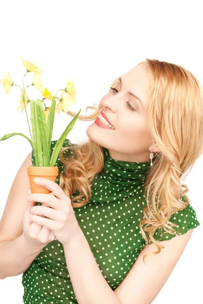 Encantadora ama de casa con flor —  Fotos de Stock