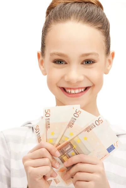 Chica adolescente con dinero en efectivo en euros — Foto de Stock