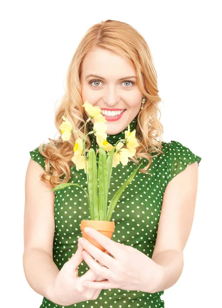 Lovely housewife with flower — Stock Photo, Image