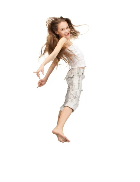 Прыгающая девочка-подросток — стоковое фото