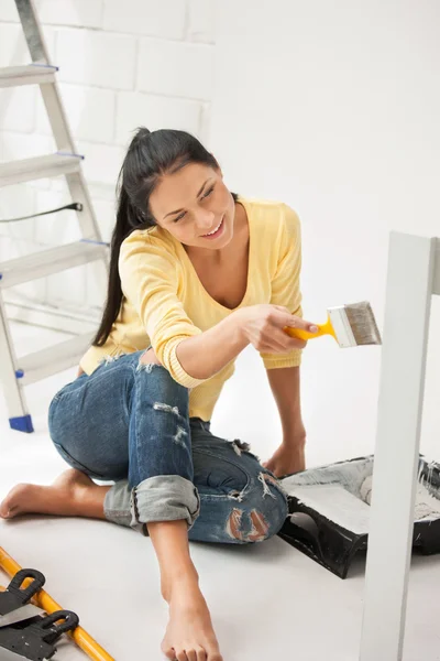 Lovely housewife painting — Stock Photo, Image