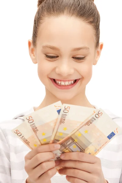 Девочка-подросток с наличными евро — стоковое фото