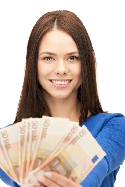 Mujer encantadora con dinero en efectivo en euros Imágenes de stock libres de derechos