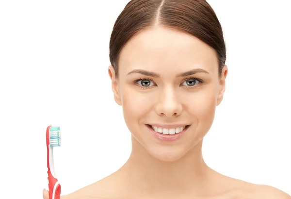 Mooie vrouw met tandenborstel — Stockfoto