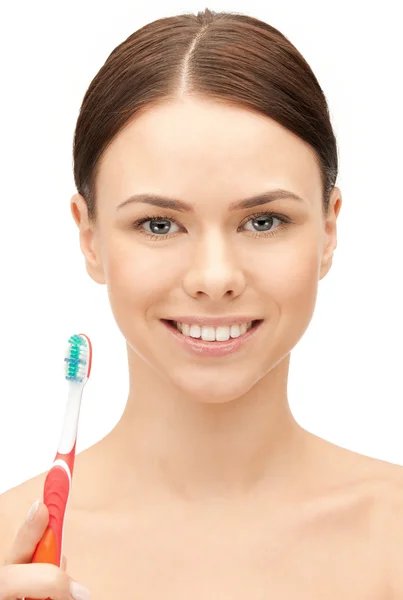 Belle femme avec brosse à dents — Photo
