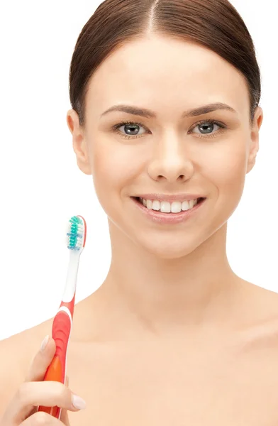 Hermosa mujer con cepillo de dientes — Foto de Stock