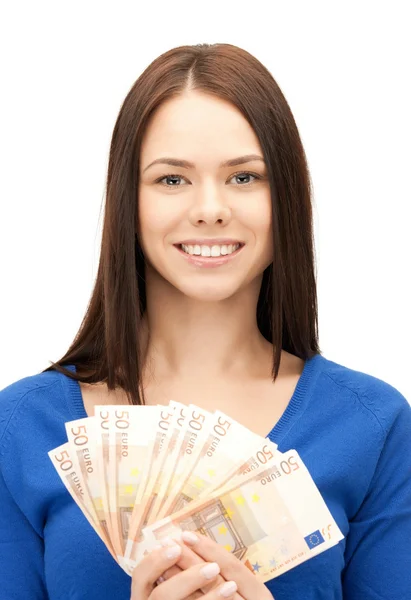 Mujer encantadora con dinero en efectivo en euros Imagen de stock