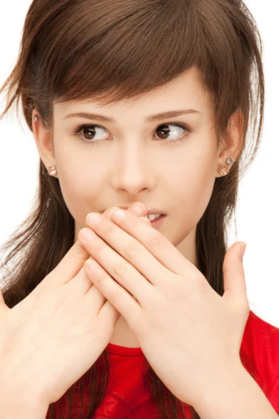 Adolescente chica con palmas sobre la boca —  Fotos de Stock