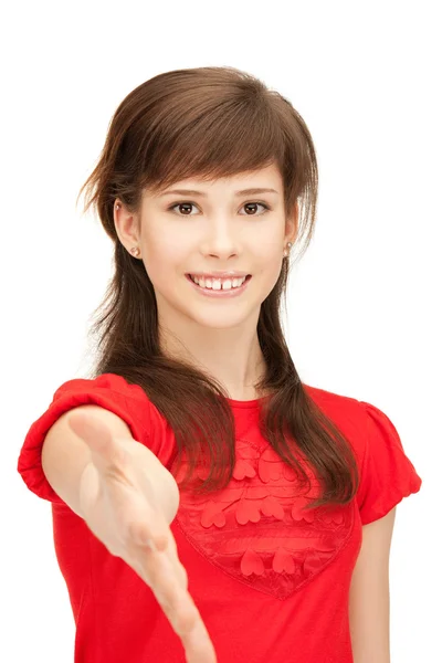 Tienermeisje met een open hand klaar voor handdruk — Stockfoto