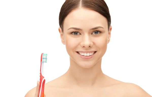 Hermosa mujer con cepillo de dientes —  Fotos de Stock