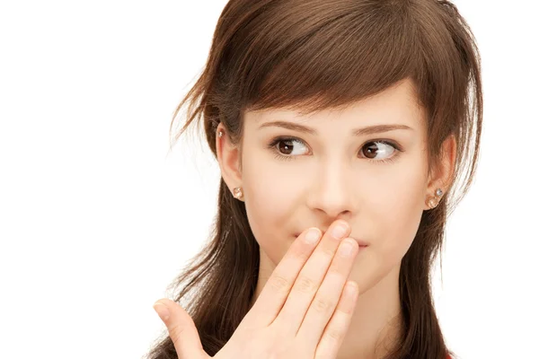 Dospívající dívka s dlaněmi ústa — Stock fotografie