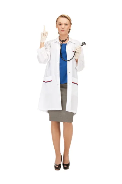 Attraktiva kvinnliga läkare med stetoskop Stockbild